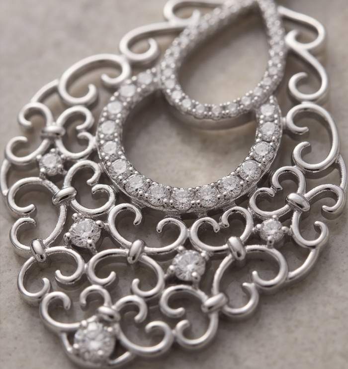 Genuine lab grown Diamond 18K White Gold over .925 Sterling Silver handcrafted Statement Earrings - Close-up of ornate diamond pendant on 18K white gold over sterling silver