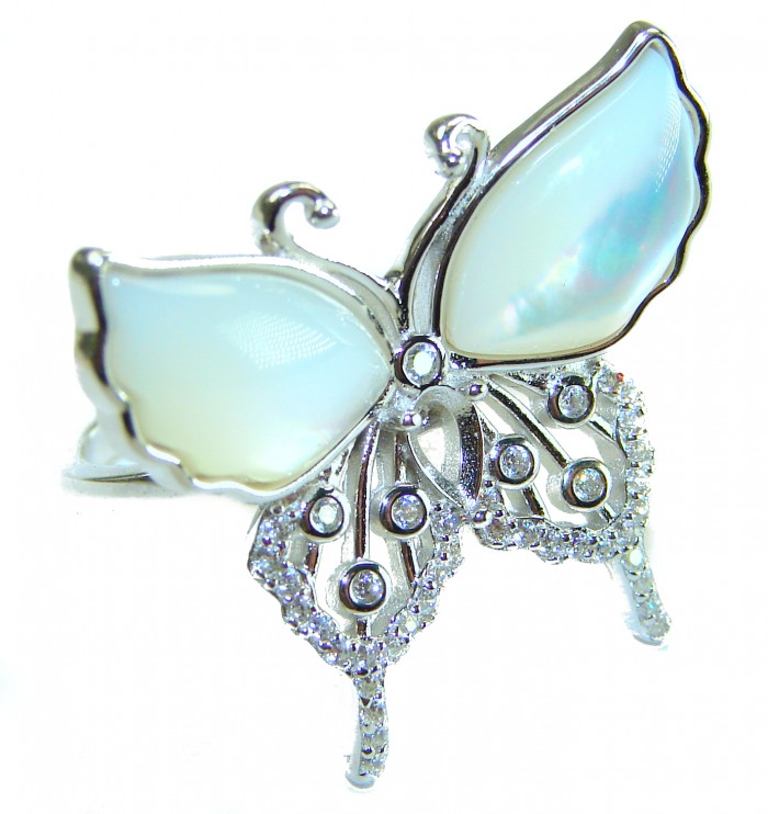 White Butterfly Blister Pearl .925 Sterling Silver brilliantly handcrafted ring s. 7 1/4 - Close-up of white butterfly blister pearl sterling silver jewelry.
