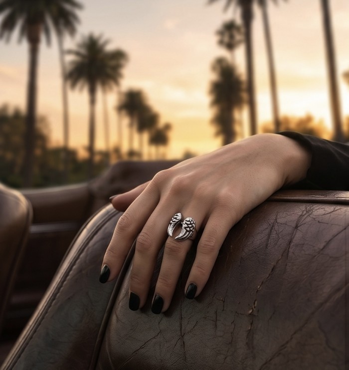 Angel's Wings Bali made .925 Sterling Silver handcrafted Ring s. 5 1/4 - Hand wearing Angel's Wings ring in .925 Sterling Silver at sunset.
