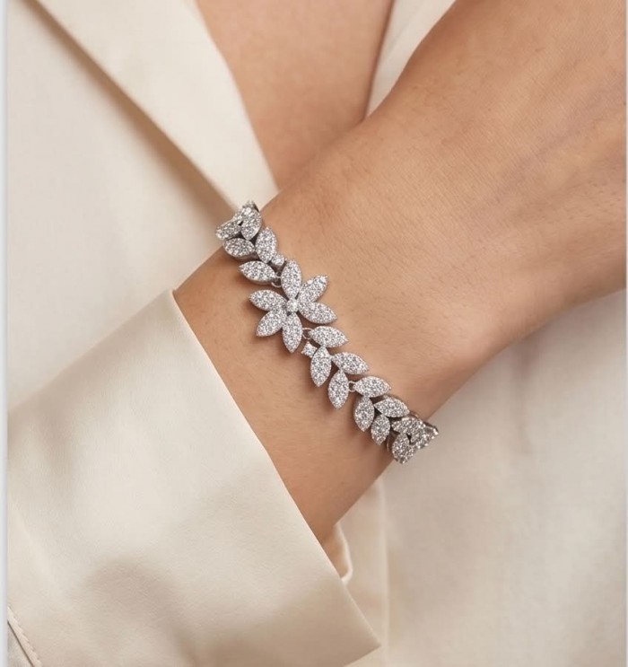 Gabriella 6.7 carat authentic White Topaz rhodium over .925 Sterling Silver handcrafted Statement Bracelet - White Topaz bracelet on wrist, leaf design detail, rhodium over .925