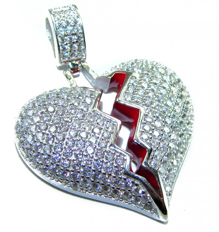 Broken Heart Luxurious 12.4 carat White Topaz .925 Sterling Silver handcrafted pendant - Broken heart pendant, top view, white topaz on sterling silver.
