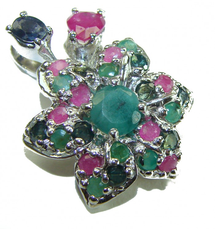 Authentic 10.5 carat Ruby Emerald Sapphire .925 Sterling Silver handcrafted Pendant - Floral gemstone pendant close-up, showcasing ruby, emerald, and sapphire stones.