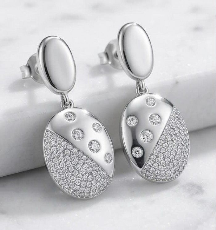 Stella Natural 2.2 carat White Topaz .925 Sterling Silver handcrafted earrings - Close-up of Stella oval earrings with white topaz, sterling silver.