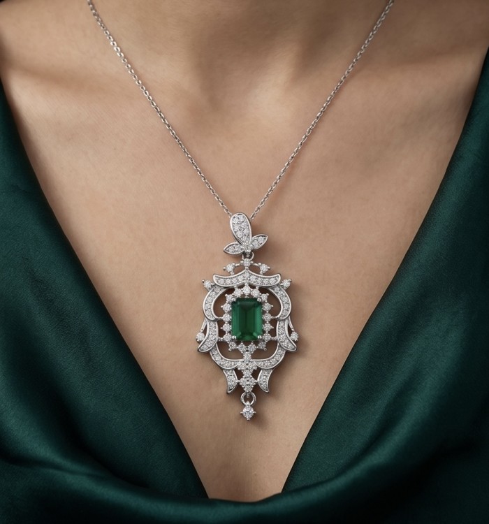 Luxurious victorian style 2.5 carat Emerald .925 Sterling Silver handmade Pendant - Elegant emerald necklace worn on neck, front view close-up.