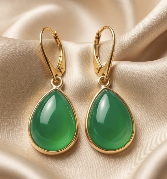 Unique genuine Jade 18K Gold over over .925 Sterling Silver handcrafted earrings - Green jade teardrop earrings on beige fabric background, front view.