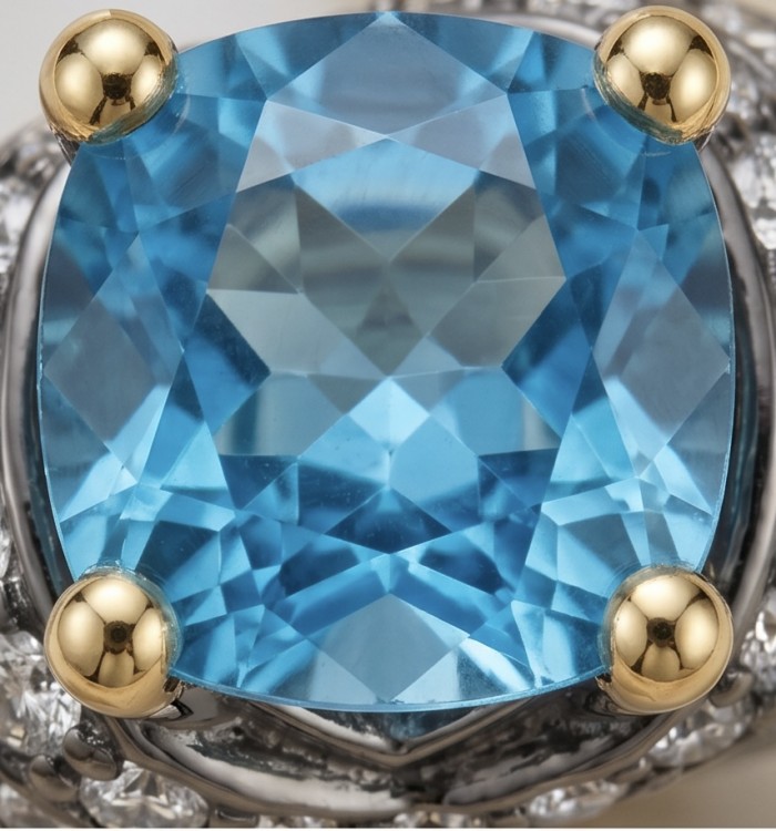 Nautilus 4.8 carat London Blue Topaz black rhodium 18K Gold over .925 Sterling Silver handcrafted Ring size 7 1/2 - Close-up of Nautilus 4.8 carat London Blue Topaz with gold prongs.