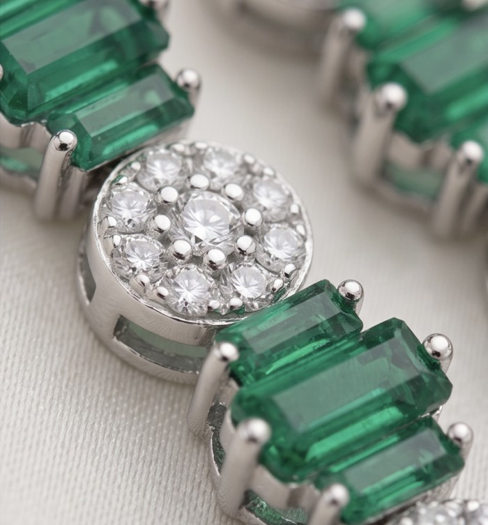 Art Deco 2.5 carat Emerald .925 Sterling Silver handcrafted earrings - Close-up of Art Deco emerald and diamond detail on sterling silver.