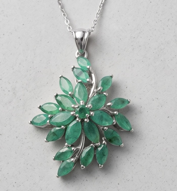 Amazonia - 18.8 carat Colombian Emerald .925 Sterling Silver handmade Statement pendant - Emerald flower pendant in sterling silver, front view.