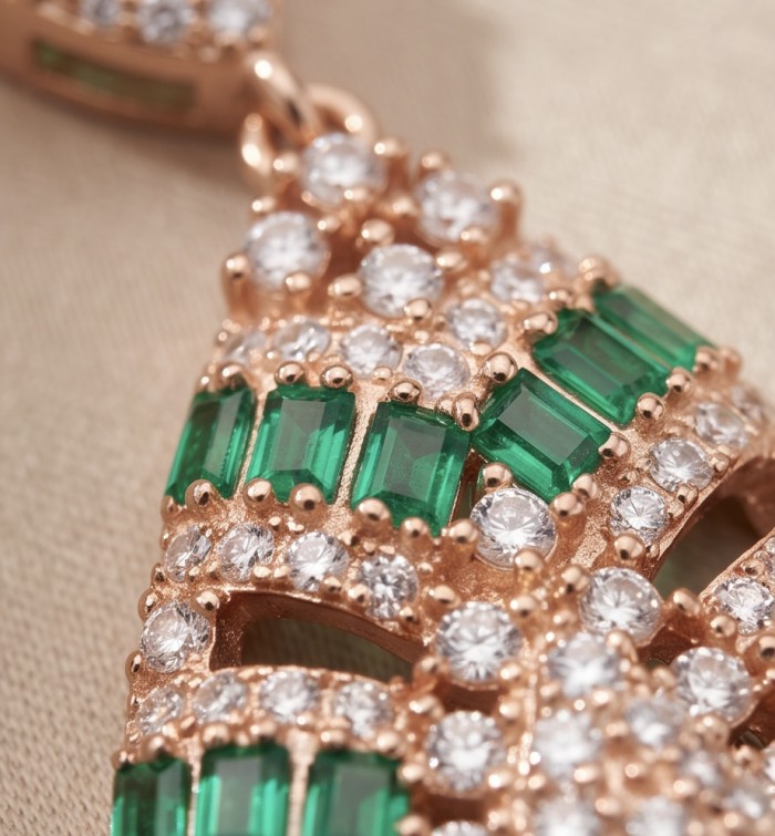 Isabella 4.2 carat oval cut Emerald 18K Rose Gold .925 Sterling Silver Perfectly handcrafted pendant - Close-up of emerald and diamond detailing on Isabella jewelry piece.
