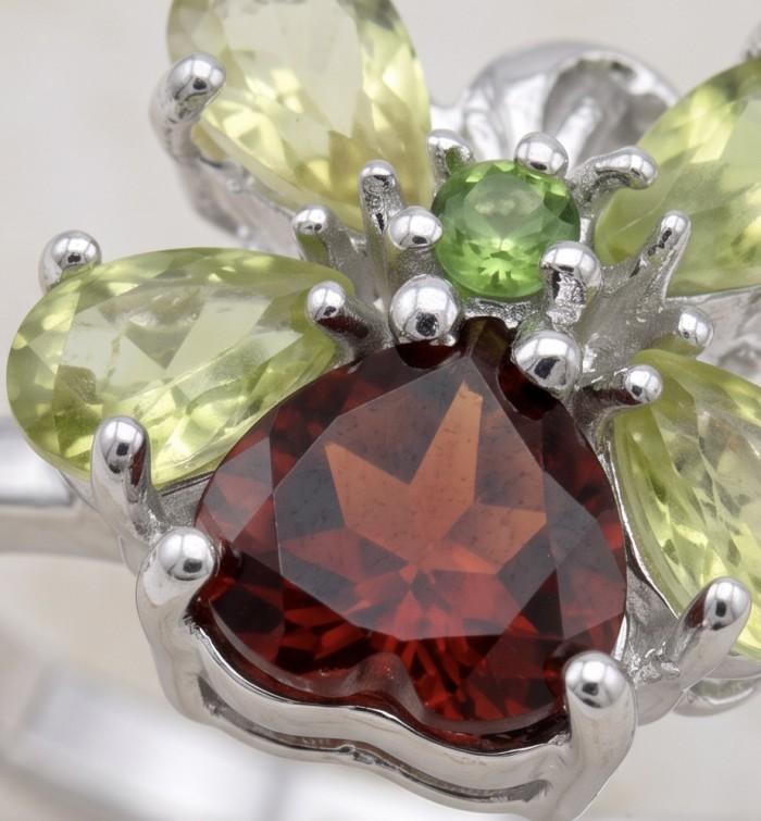 Victoria 6.5 carat Amethyst rhodium over .925 Sterling Silver Handcrafted Ring size 8 - Close-up of Victoria ring with amethyst and peridot stones in silver setting.