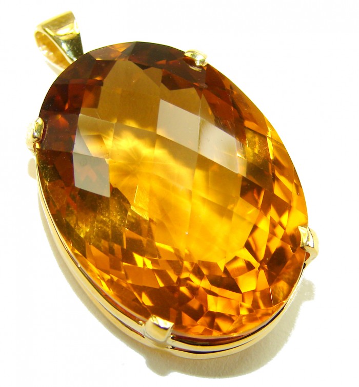 Luxury genuine 39.7 CARAT oval cut Champagne Topaz .925 Sterling Silver dipped in 22K Gold handmade Pendant - Close-up of luxury 39.7 carat oval cut Champagne Topaz pendant.