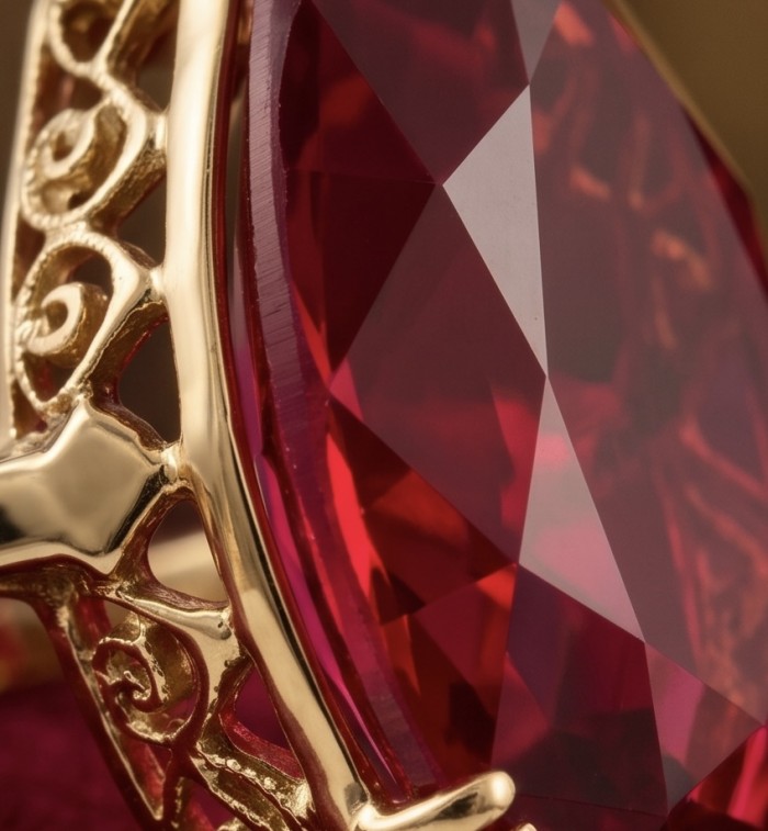 Carmen Natural 25.4 carat Ruby .925 Sterling Silver dipped in 22K Gold handmade Large Statement Ring size 8 3/4 - Close-up of 25.4 carat ruby in ornate gold setting.