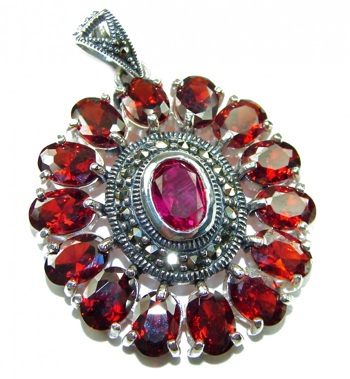 Marvelous Natural 20.8 carat Mozambique Garnet .925 Sterling Silver Handcrafted pendant - Close-up of garnet pendant with sterling silver setting.