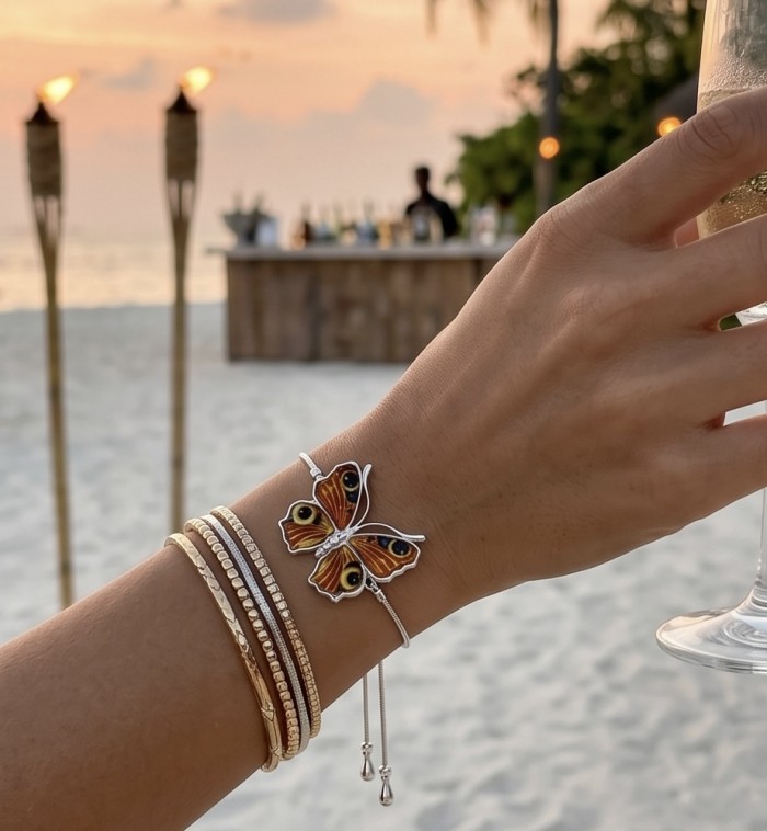 Golden Butterfly Genuine carved Baltic Amber .925 Sterling Silver handamde Bracelet - Golden butterfly amber bracelet worn on wrist, beach background