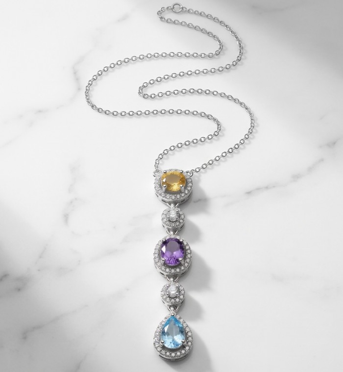 Infinity 8.5 carat Authentic Multigems Rhodium over .925 Sterling Silver handcrafted Statement necklace - Pendant necklace with multicolored gems on a marble background.