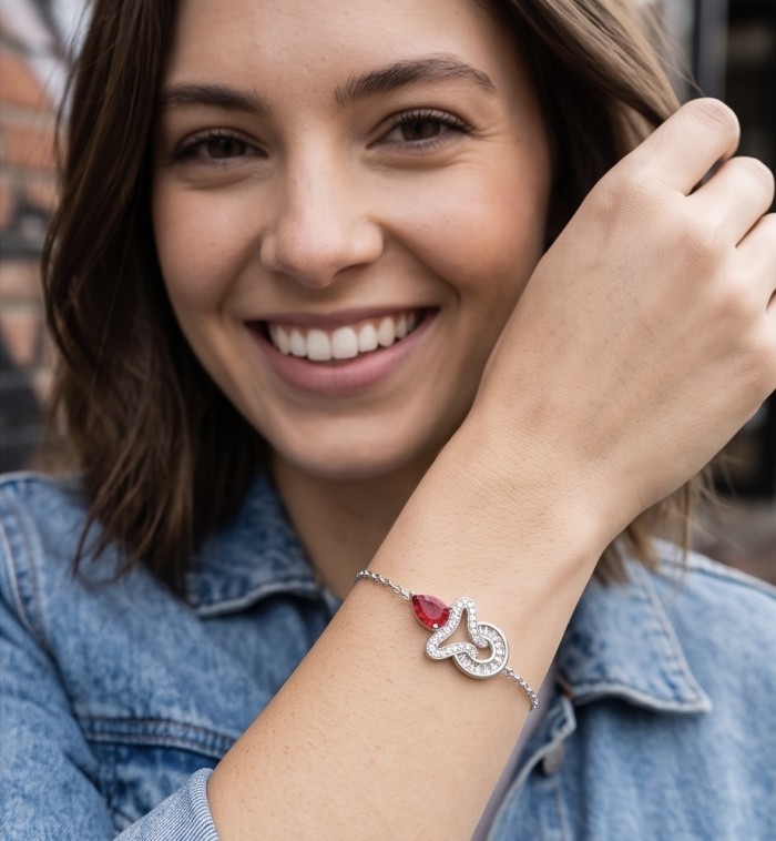 Giovanna - Magnificent Jewel 3.8 carat Ruby .925 Sterling Silver handcrafted incredible Statement Bracelet - Woman wearing Giovanna ruby bracelet, close-up on wrist.