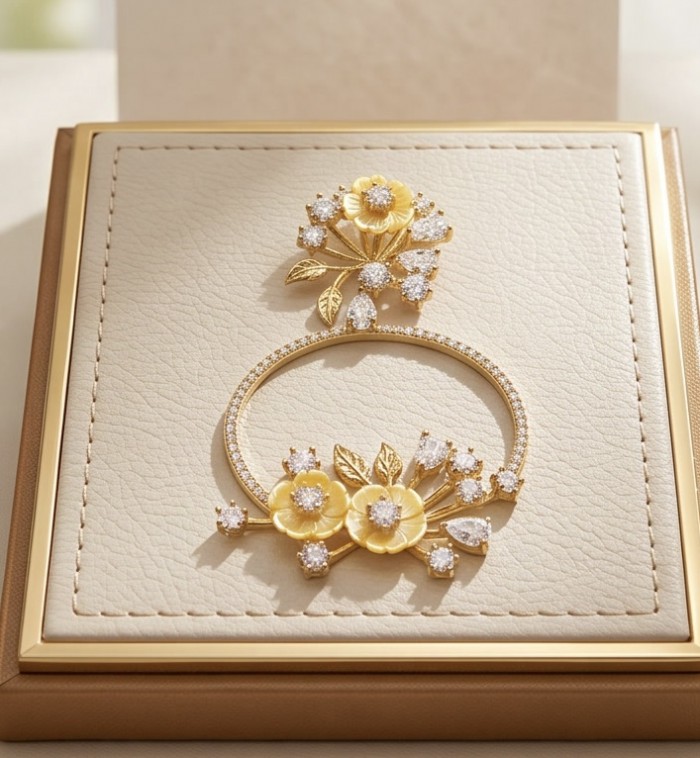 Secret Melody Authentic 11.2 carat Moissanite 22K Gold over .925 Sterling Silver handcrafted Statement Pendant - Floral jewelry set in Moissanite and 22K gold on display box, top view.