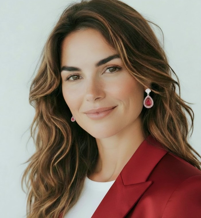 Giovanna - Magnificent classic design - 10.2 carat Kasmir Ruby .925 Sterling Silver dippedin 22K Rose Gold handcrafted incredible Statement earrings - Woman wearing Kasmir R earrings in a classic design, side view.