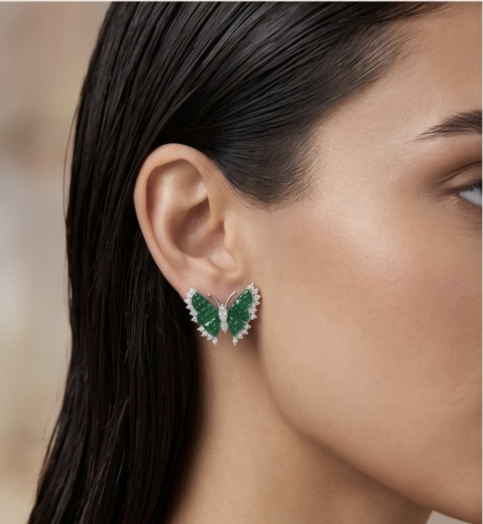 Incredible green Butterflies mystery setting genuine 11.5 CARAT Emerald .925 Sterling Silver handcrafted Earrings - Side view of butterfly earrings with green gems and diamond accents.