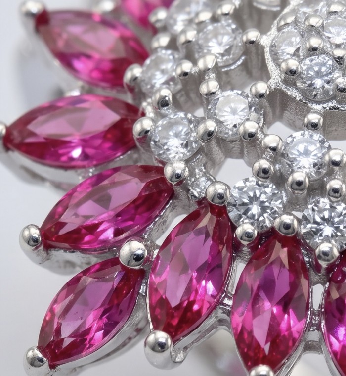 Scarlett 2.4 ctw Mozambique Ruby .925 Sterling Silver handcrafted Statement Ring size 8 - Close-up of Scarlett 2.4 ctw ruby and silver jewelry detail.