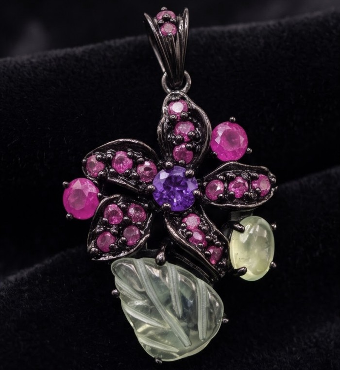 Divine creation 15.8 carat Precious Amethyst .925 Sterling Silver dipped in black rhodium handcarfted Pendant - Close-up of floral pendant with gemstones on a black velvet background.