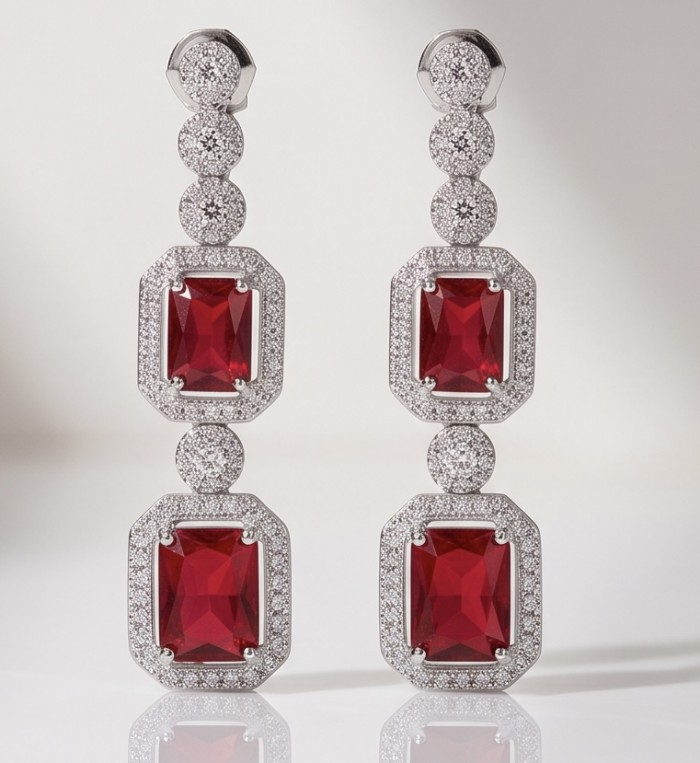 Exquisite 9.4 ctw Mozambique Ruby .925 Sterling Silver handcrafted Statement earrings - Front view of sterling silver earrings with red rubies and diamonds.