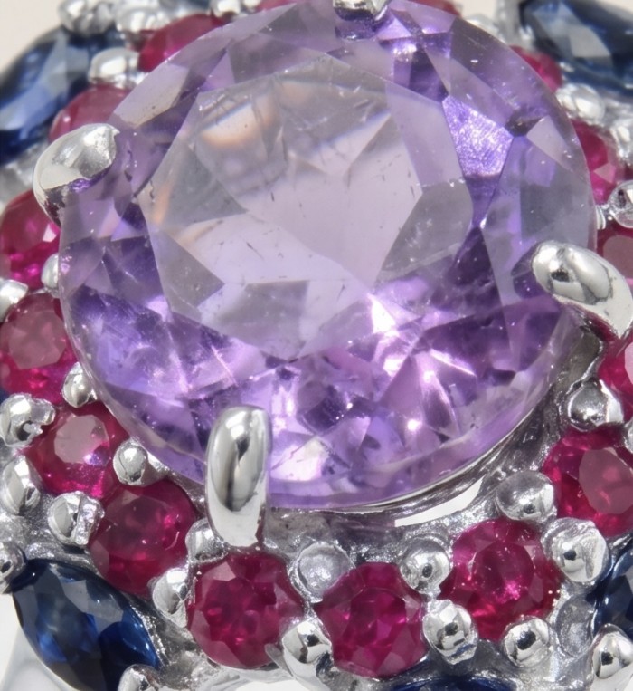 Stella 5.4 carat Amethyst rhodium over .925 Sterling Silver Handcrafted Ring size 8 - Stone close-up of amethyst with red and blue accents on sterling silver.