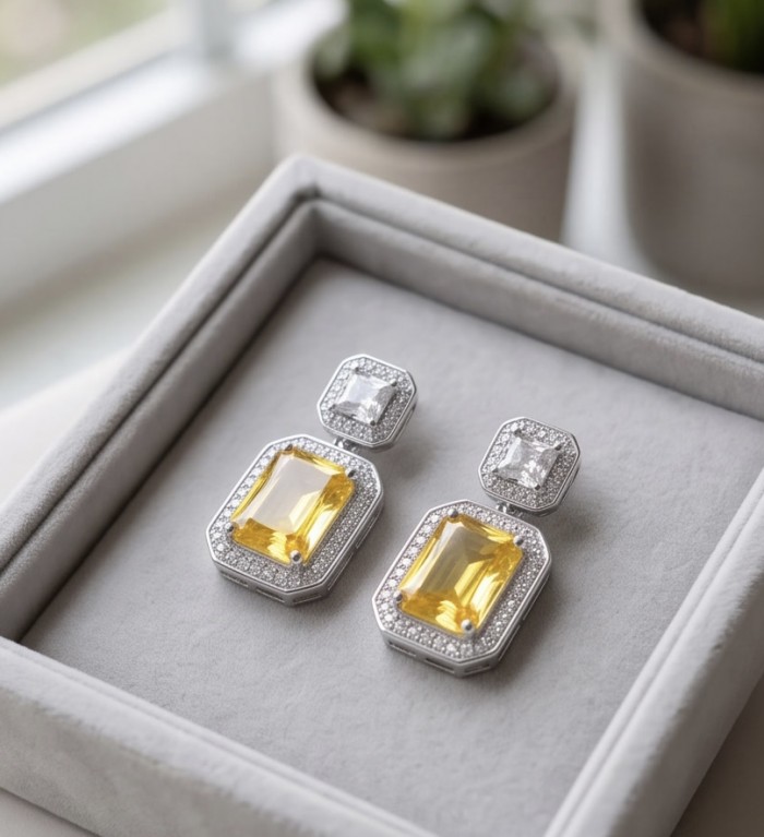 Art Deco - Luxurious baquette cut 8.5 carat Yellow Sapphire rhodium over .925 Sterling Silver handcrafted earrings - Luxurious Art Deco earrings with yellow sapphire, top view.