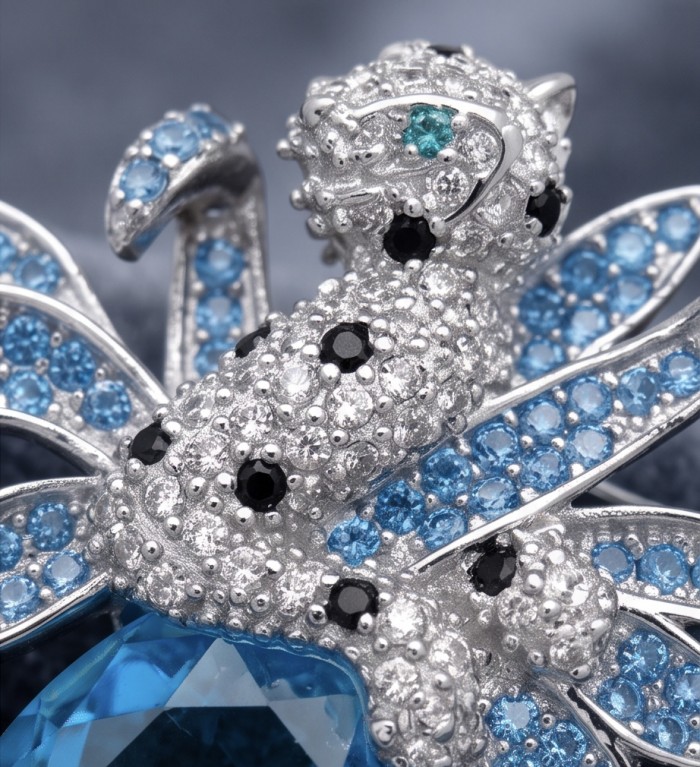 Blue Cheetah authentic 12.5 carat Swiss Blue Topaz .925 Sterling Silver Handcrafted pendant brooch - Close-up of Blue Cheetah jewelry with topaz and gemstone details.