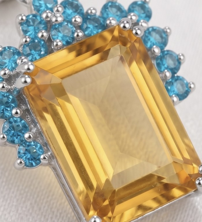 Summer Time 17.8 carat Lemon Quartz rhodium over .925 Sterling Silver handcrafted Statement Earrings - Close-up of Lemon Quartz with blue stones in silver setting.