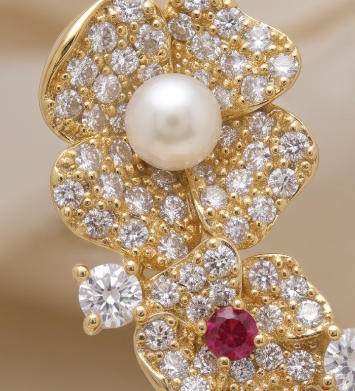 Luxurious 12.9 carat natural Mozambique Ruby 18K Gold over .925 Sterling Silver handcrafted earrings - Close-up of floral design with ruby, diamonds, and pearl in 18K gold.