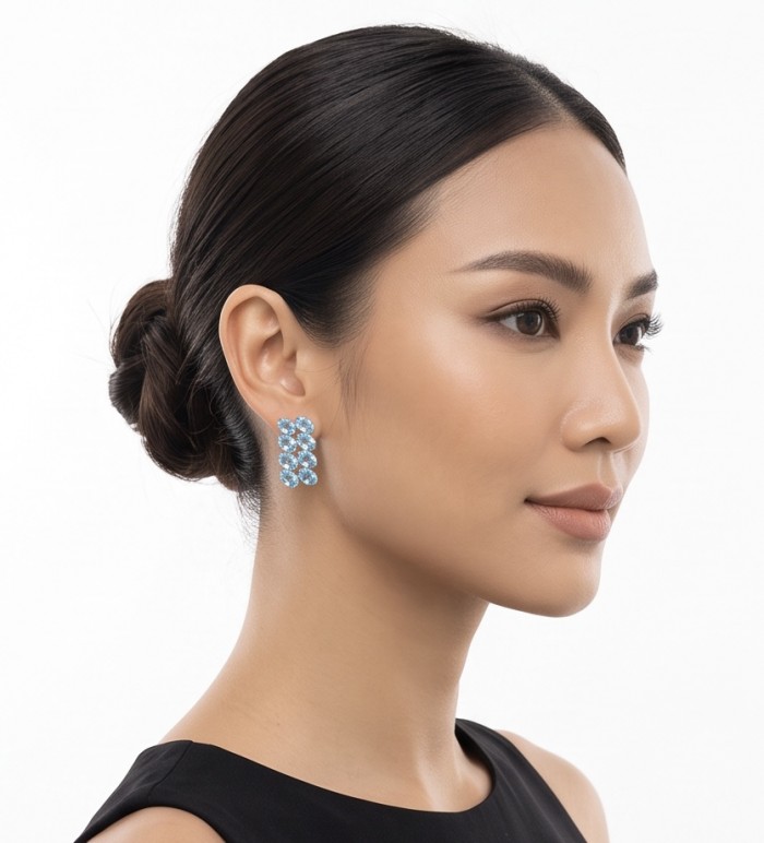 Serenity 27.4 carat genuine Swiss Blue Topaz .925 Sterling Silver handmade Statement Handcrafted earrings - Side view of Serenity Swiss Blue Topaz earrings worn on model.