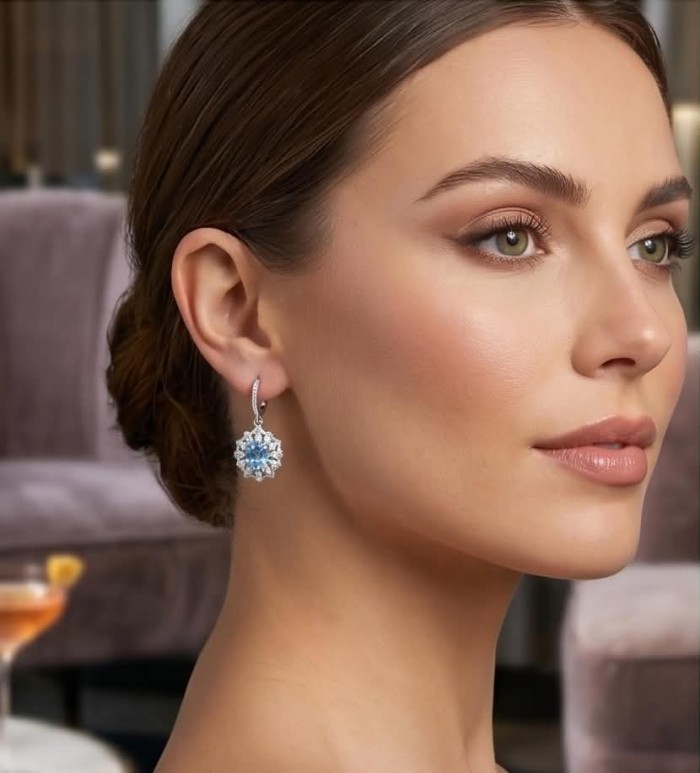 Serenity 4.5 carat genuine Swiss Blue Topaz .925 Sterling Silver handmade earrings - Side view of woman wearing Serenity 4.5 carat Swiss Blue Topaz earrings