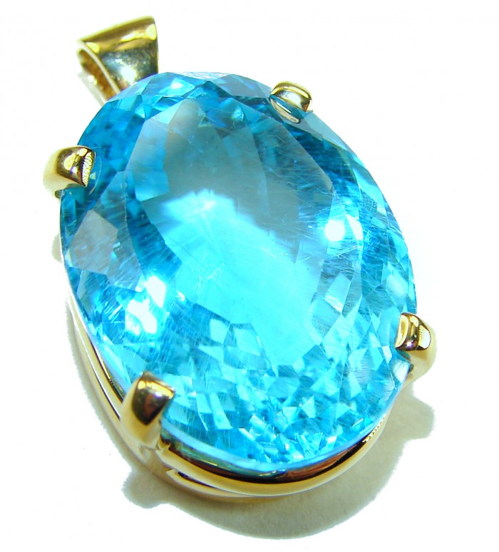 Atlantica oval cut 25.9 carat Swiss Blue Topaz 18K Gold over .925 Sterling Silver Handcrafted Pendant - Close-up of Atlantica oval Swiss Blue Topaz pendant in 18K gold setting