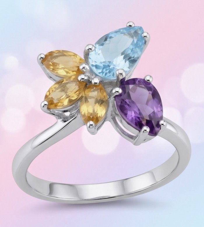 Pacifica 7.8 carat Swiss Blue Topaz .925 Sterling Silver handcrafted ring size 9 - Side view of Pacifica ring with blue, purple, and yellow gemstones.