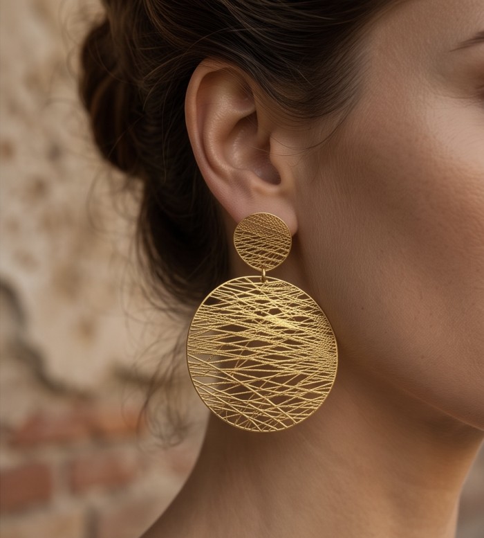 Dubai Style - .925 Sterling Silver dipped in 22K Gold handmade Earrings - Side view of large circular gold earrings worn on ear.