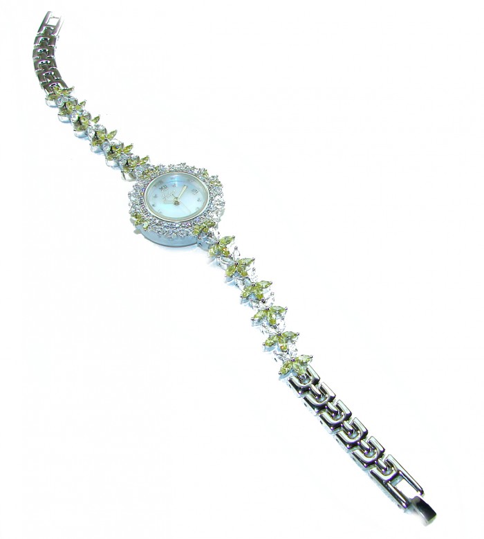 Precious 108.8 carat natural Peridot White Topaz .925 Sterling Silver handmade Bracelet - Watch - Luxurious Peridot White Topaz watch, top view on white background.