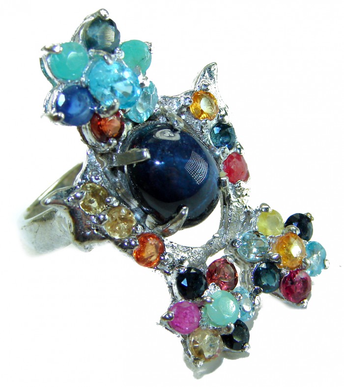 Classic design Genuine 16.5 carat Star Sapphire .925 Sterling Silver handcrafted Ring size 7 - Colorful gemstone ring with star sapphire, angled side view.