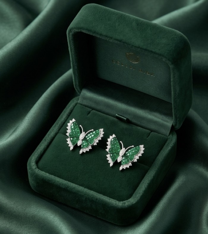 Incredible green Butterflies mystery setting genuine 11.5 CARAT Emerald .925 Sterling Silver handcrafted Earrings - Butterfly earrings in green velvet box, top view.