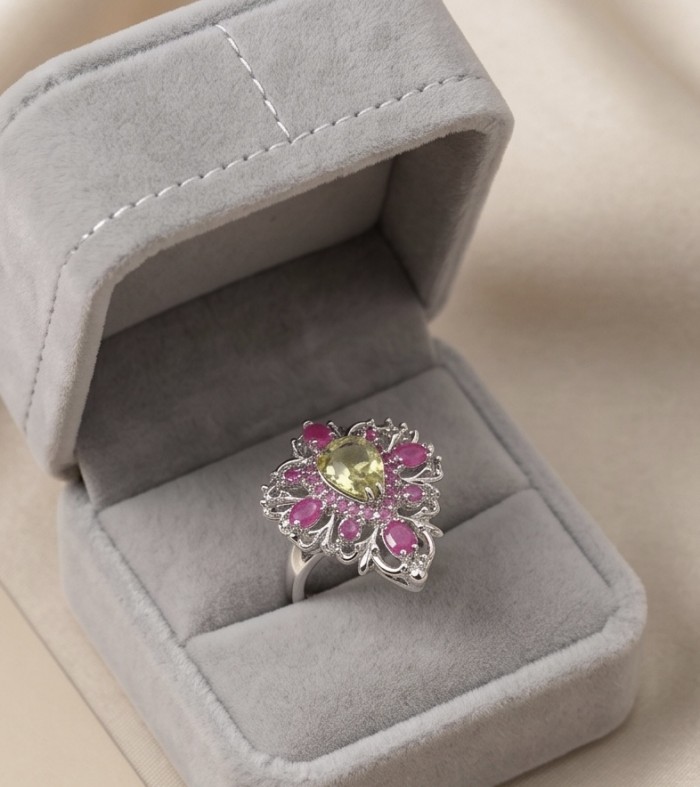 Giovanna - Authentic 17.9 carat Green Amethyst Ruby .925 Sterling Silver dipped in rhodium handcrafted Statement Ring size 7 - Ring in gray box, top view, green amethyst and ruby design.