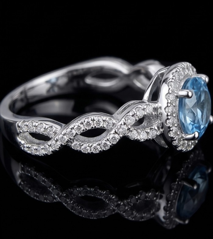 Atlntica 5.8 carat Swiss Blue Topaz .925 Sterling Silver dipped in rhodium handcrafted ring size 8 - Side view of sterling silver ring with blue topaz and diamond accents.