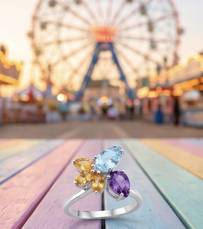 Pacifica 7.8 carat Swiss Blue Topaz .925 Sterling Silver handcrafted ring size 9 - Colorful gemstone ring on a boardwalk with a Ferris wheel background