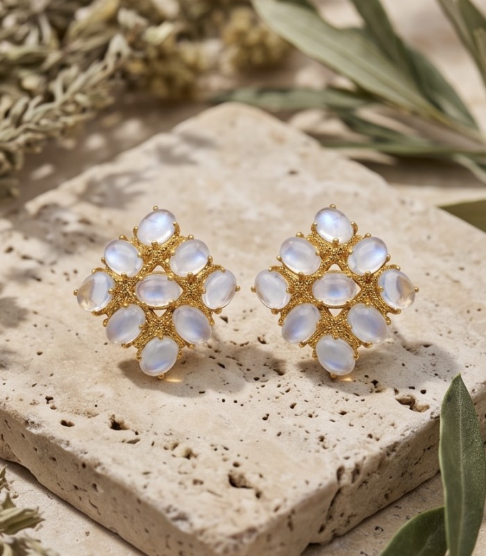Scarlett 15.5 carat Brazilian Rose Quartz 22K Gold over .925 Sterling Silver handcrafted Statement Earrings - Gold earrings with rose quartz on stone background, top view.