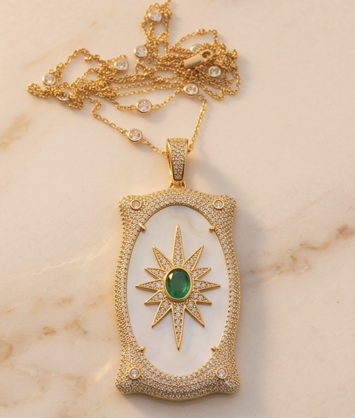 Precious Blister Pearl 2.4 carat Emerald 18K Gold over .925 Sterling Silver .925 Sterling Silver Necklace; 24 inches long - Gold necklace with emerald and pearl centerpiece, top view.