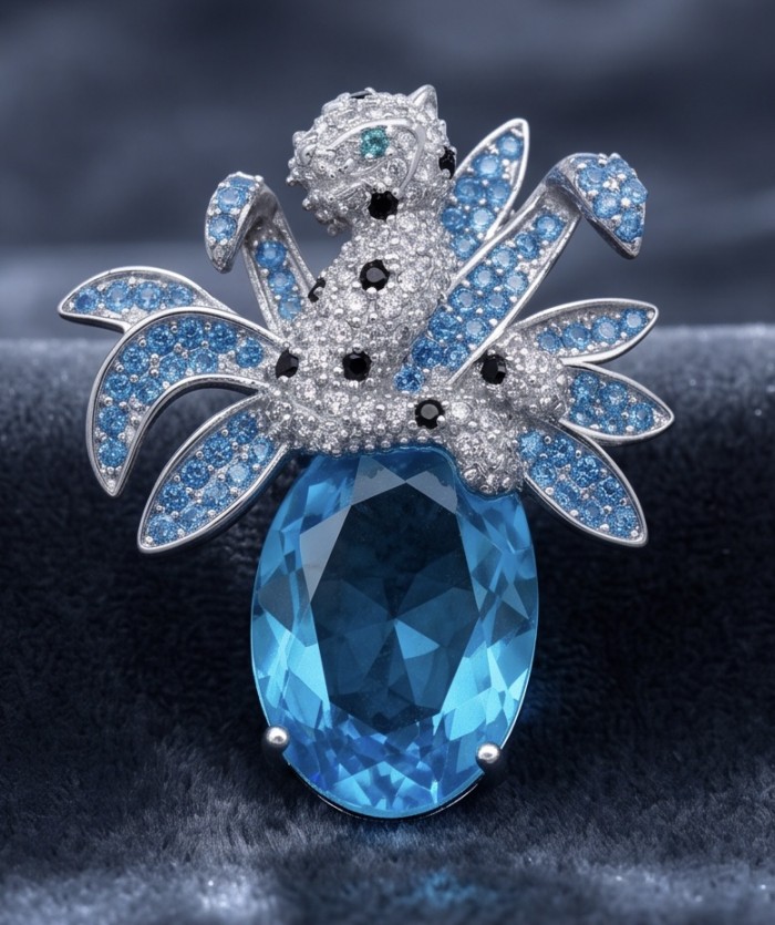 Blue Cheetah authentic 12.5 carat Swiss Blue Topaz .925 Sterling Silver Handcrafted pendant brooch - Close-up of Blue Cheetah brooch with 12.5 carat Swiss Blue Topaz