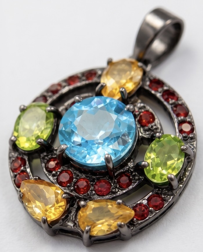 Atlantica - amazing quality 5.5 CARAT genuine Swiss Blue Topaz black rhodium over .925 Sterling Silver handmade pendant - Close-up of a colorful gemstone pendant with blue, green, and yellow stones.