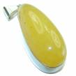 An exuberantly Large authentic butterscotch  Baltic Amber  .925 Sterling Silver handcrafted pendant