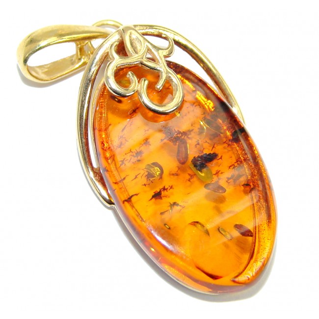 Incredible natural Baltic Amber Gold over .925 Sterling Silver handmade Pendant