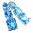 A Wild Ocean genuine Swiss Blue Topaz  .925 Sterling Silver handcrafted earrings
