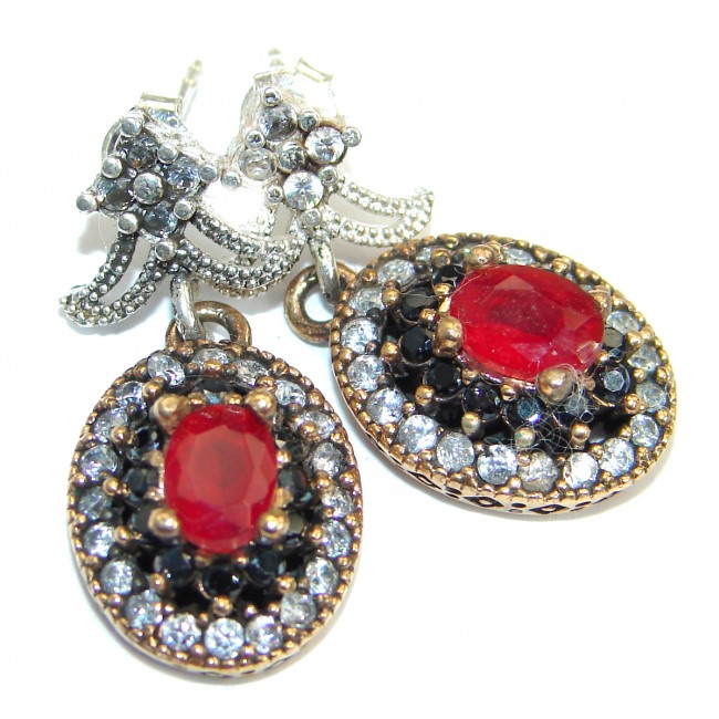 Trendy created Ruby .925 Sterling Silver handmade earrings